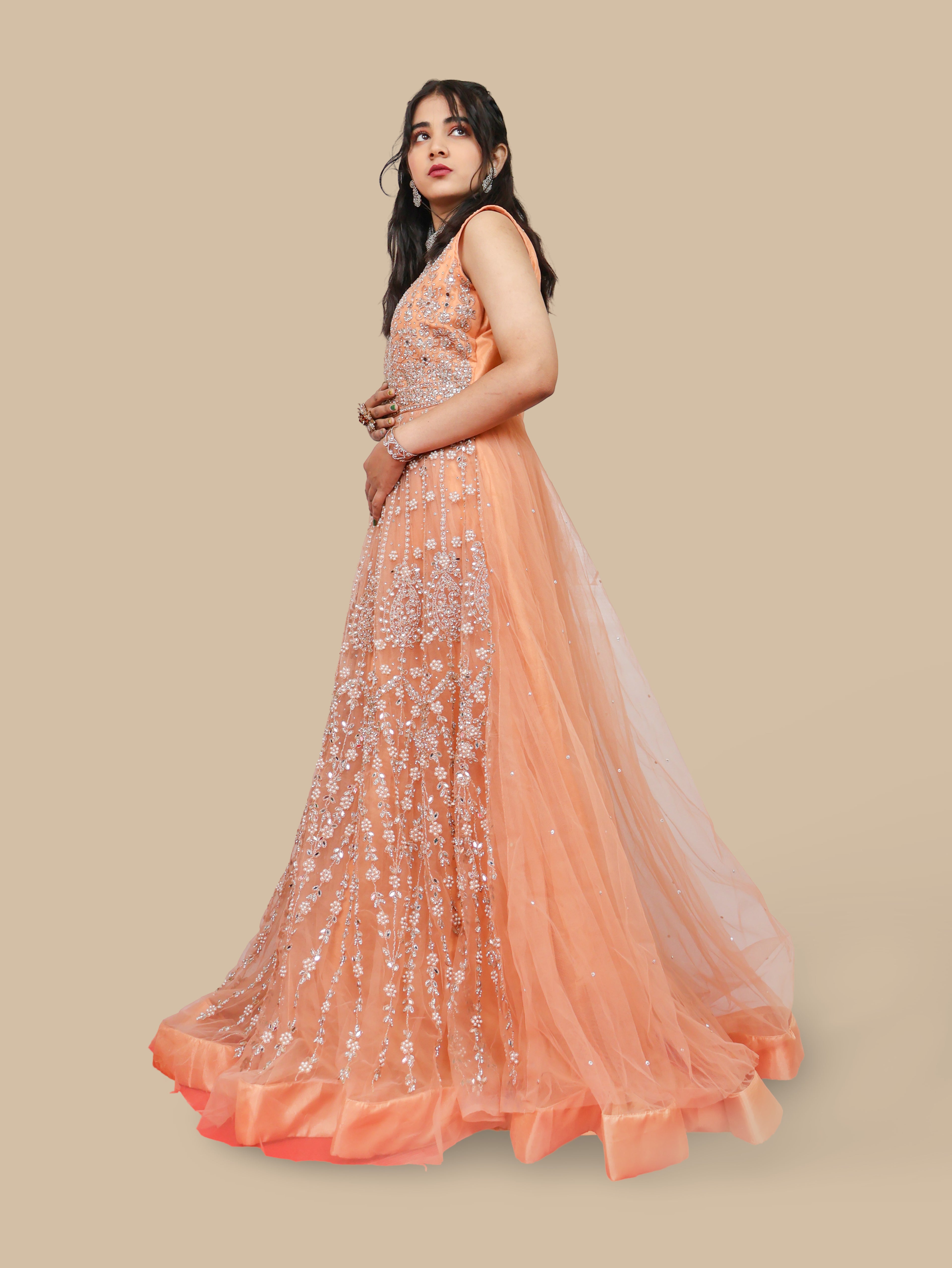 Net Fabric Gown with Pearl & Embroidery by Shreekama Peach Designer Gowns for Party Festival Wedding Occasion in Noida