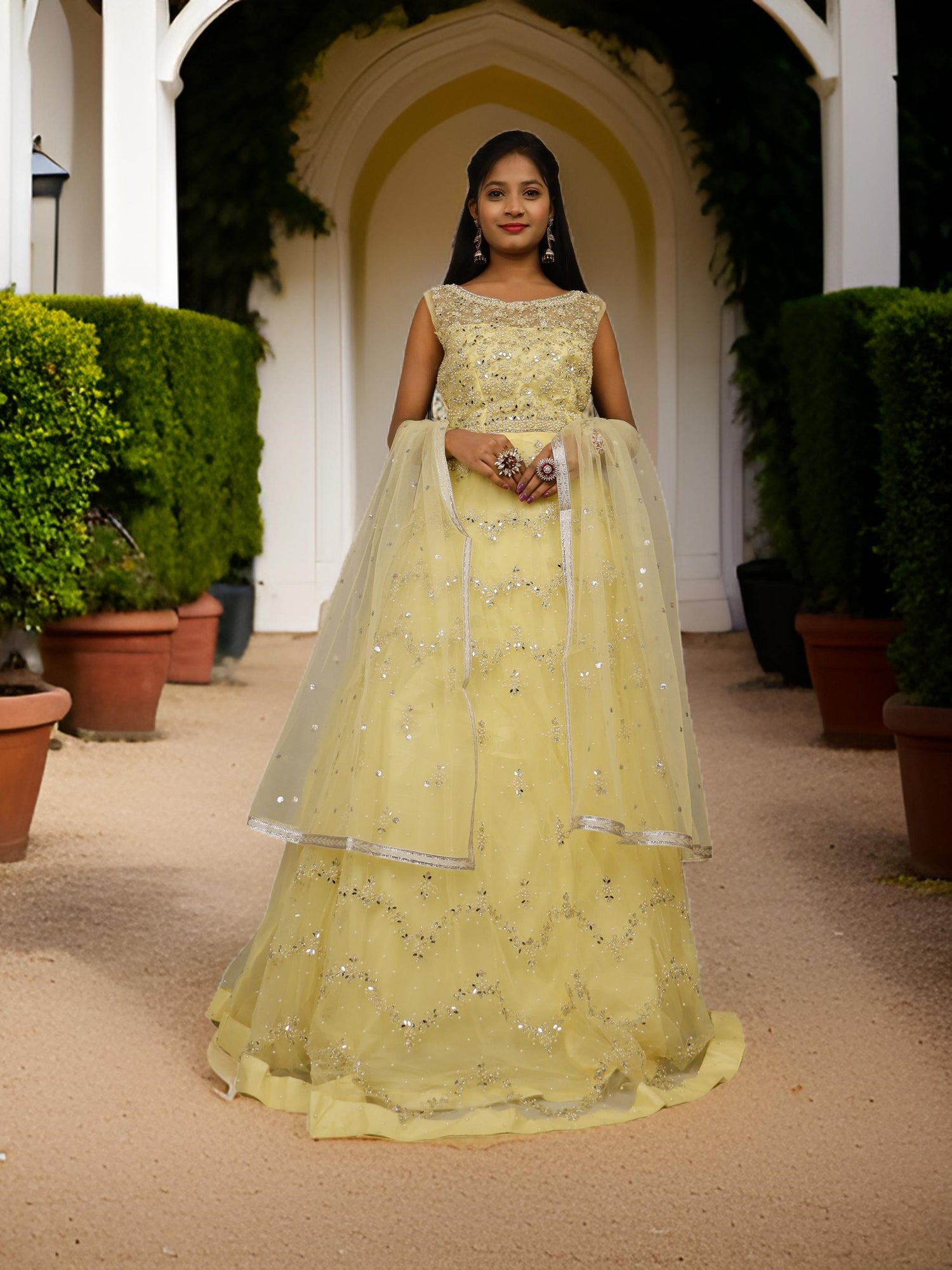 Gown with Pearls & Sequin by Shreekama Lemon Yellow Designer Gowns for Party Festival Wedding Occasion in Noida