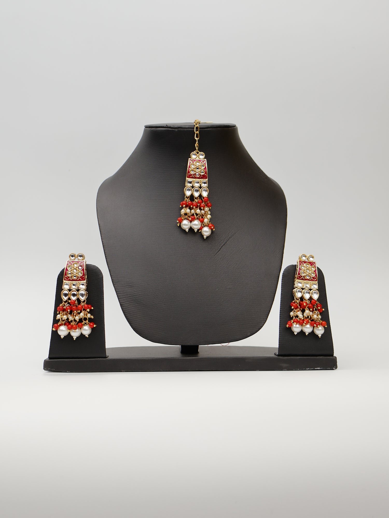 Red Meenakari Kundan & Pearl Necklace Set with Earrings & Mang Tikka. Fashion Jewelry for Party Festival Wedding Occasion in Noida