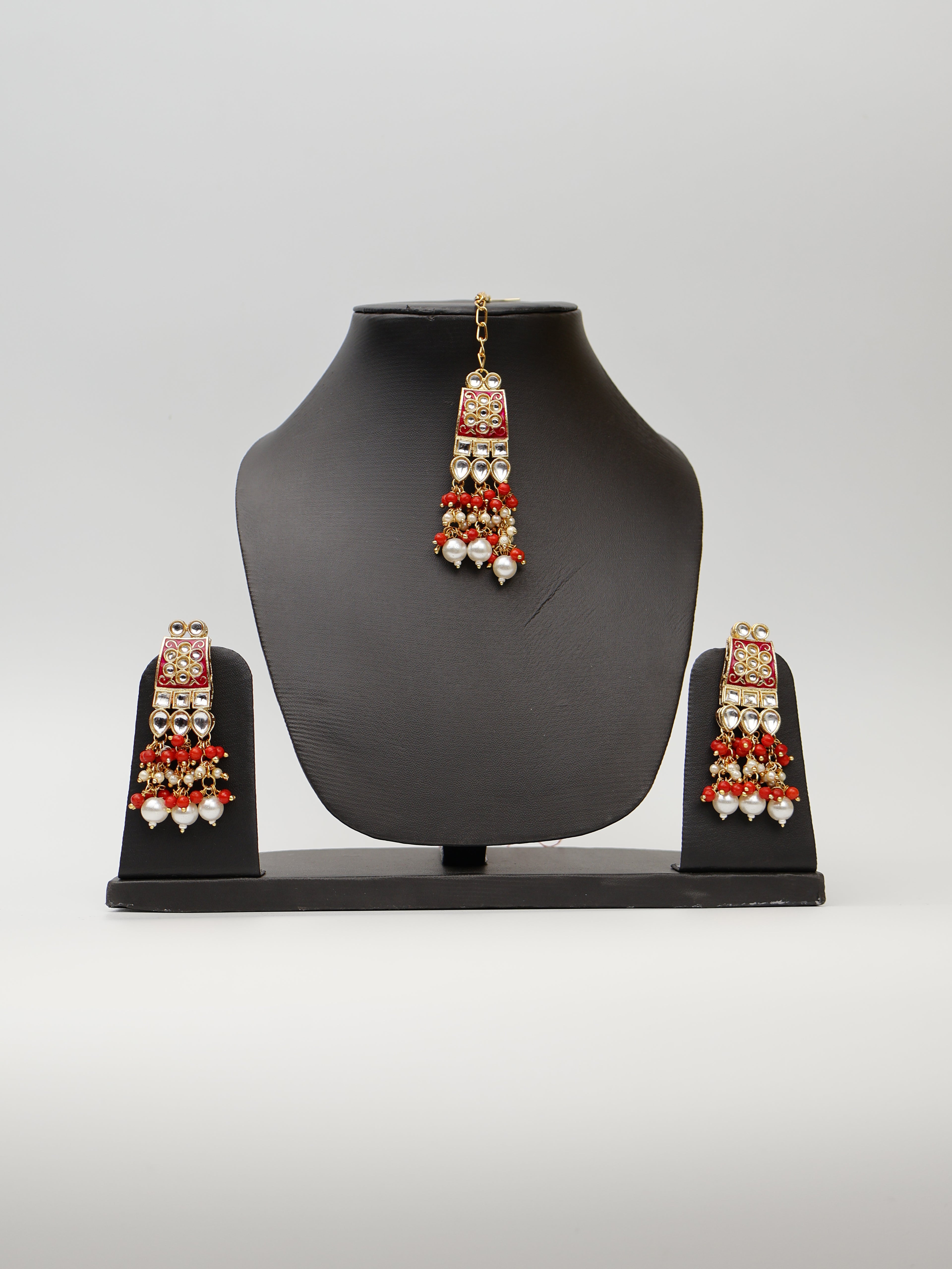 Red Meenakari Kundan & Pearl Necklace Set with Earrings & Mang Tikka. Fashion Jewelry for Party Festival Wedding Occasion in Noida
