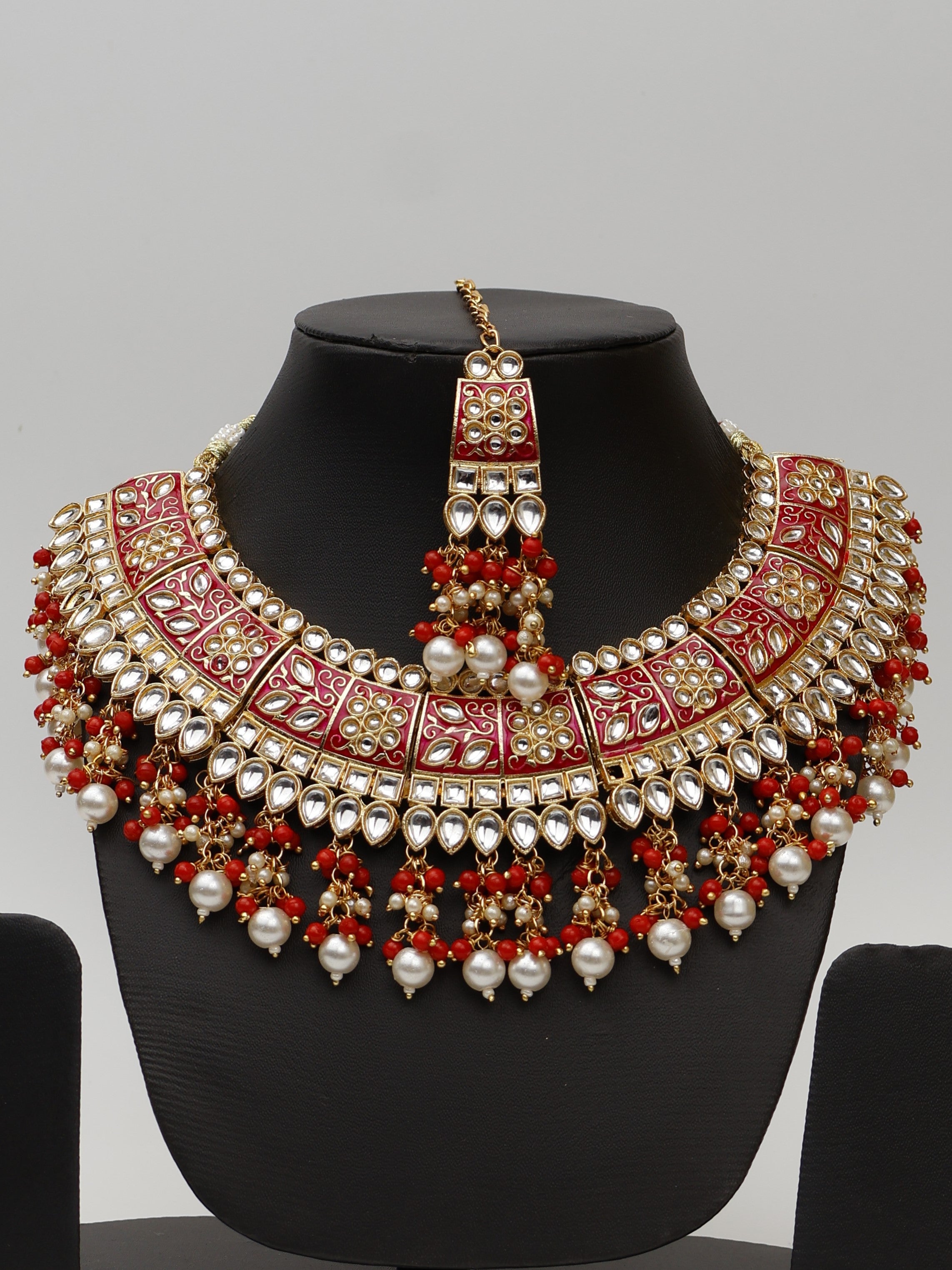 Red Meenakari Kundan & Pearl Necklace Set with Earrings & Mang Tikka. Fashion Jewelry for Party Festival Wedding Occasion in Noida