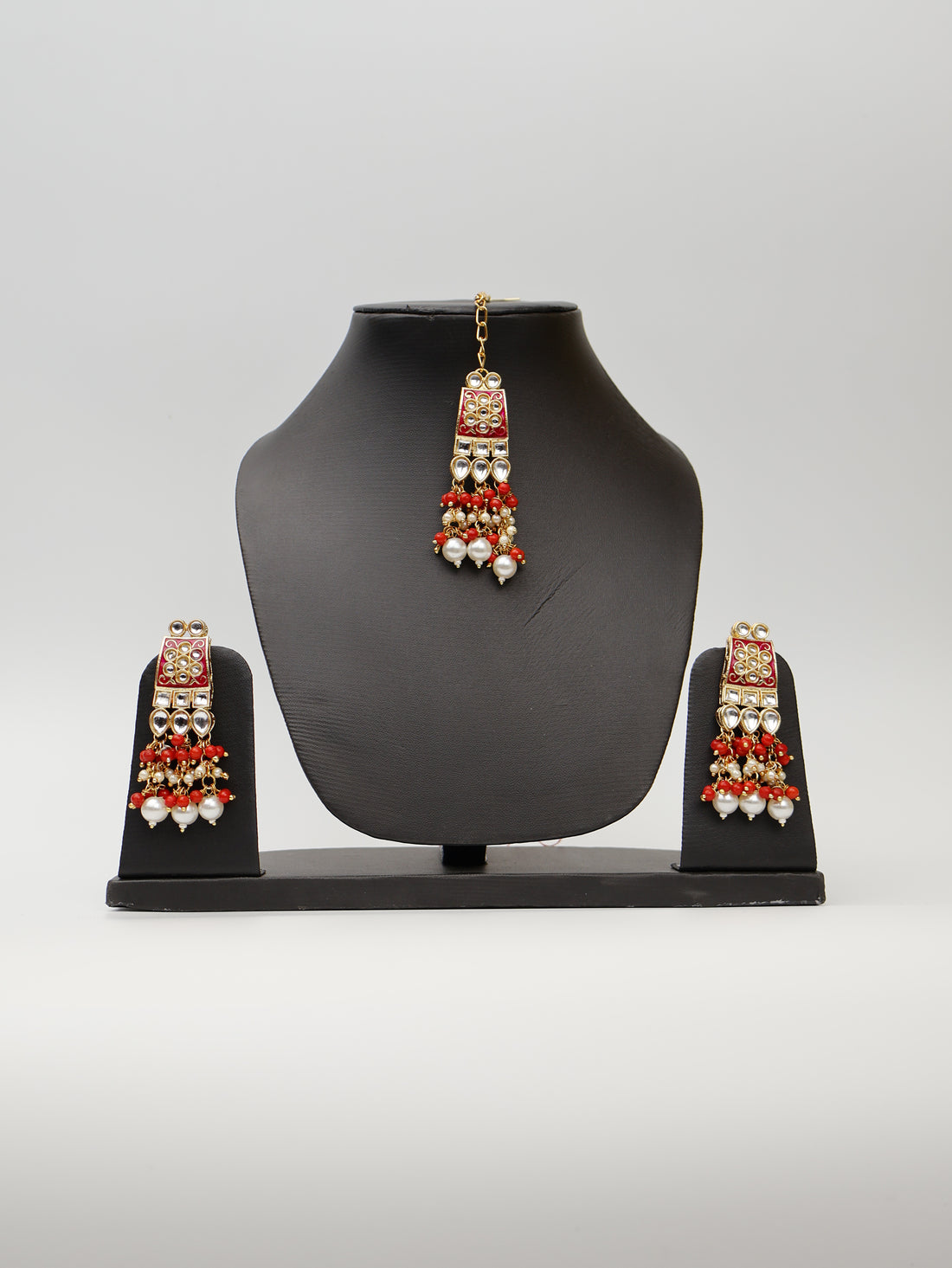 Red Meenakari Kundan & Pearl Necklace Set with Earrings & Mang Tikka. Fashion Jewelry for Party Festival Wedding Occasion in Noida